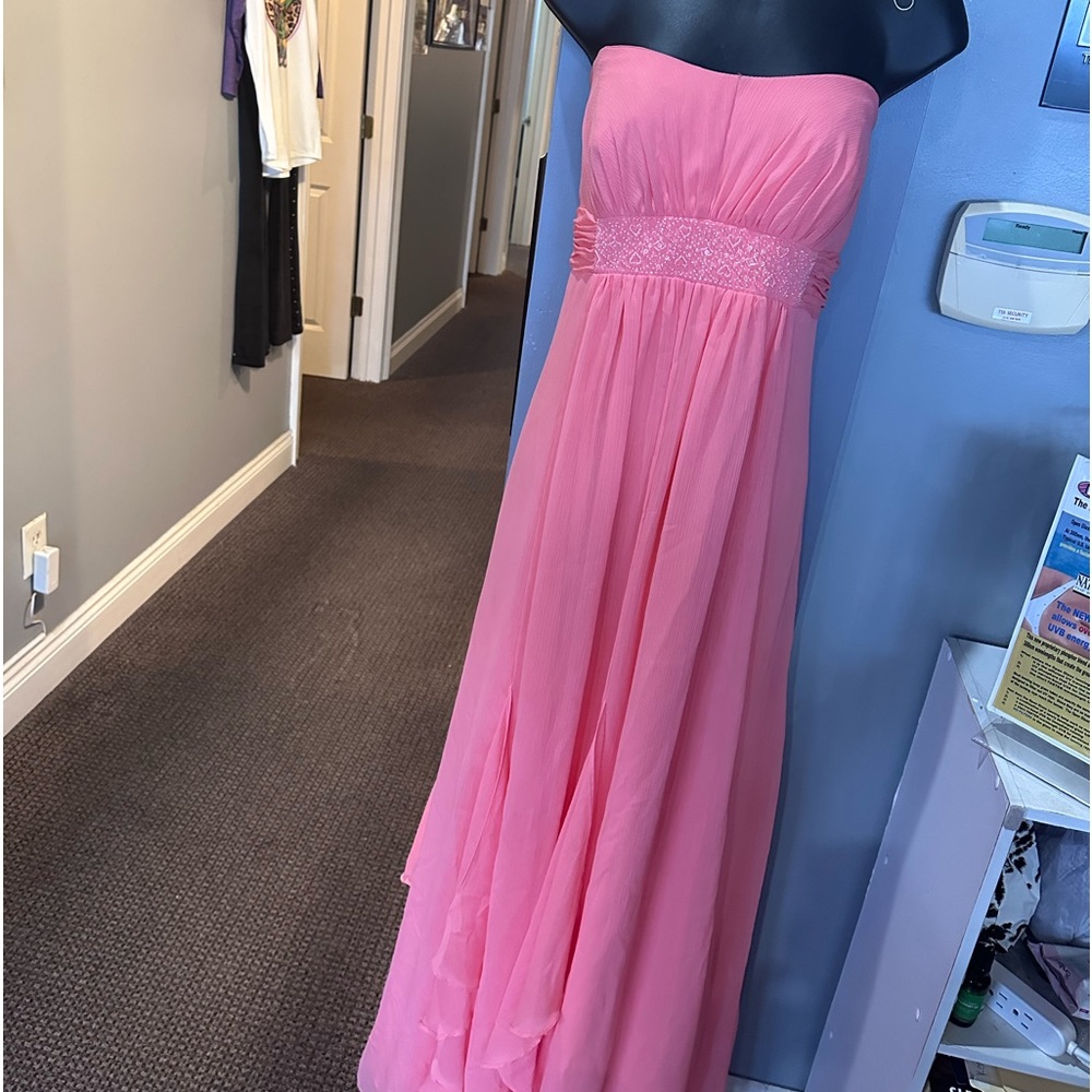 Coral strapless formal worn one time.